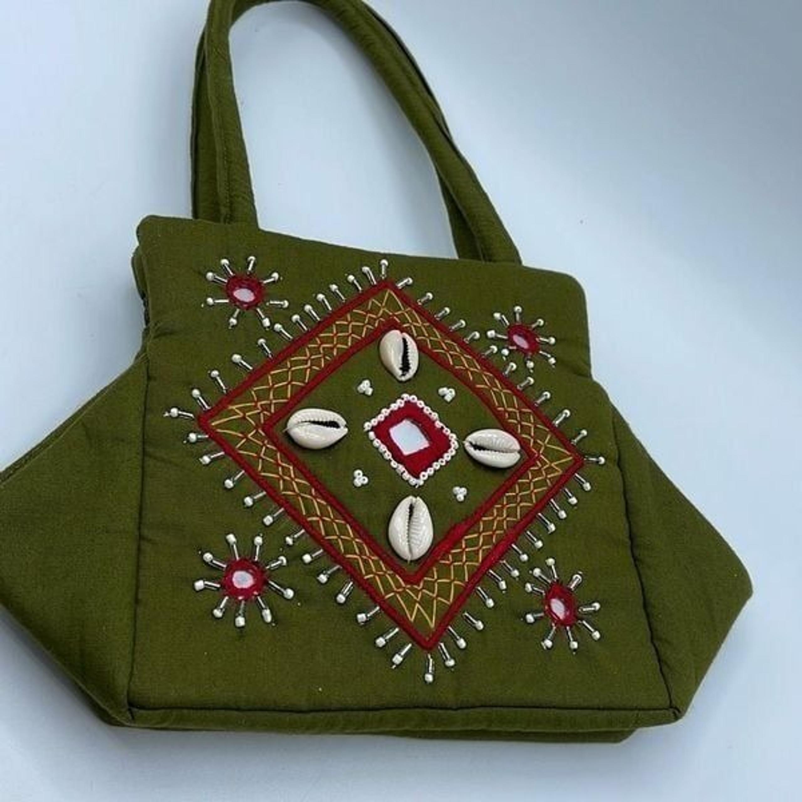Green beaded  quilted satchel.