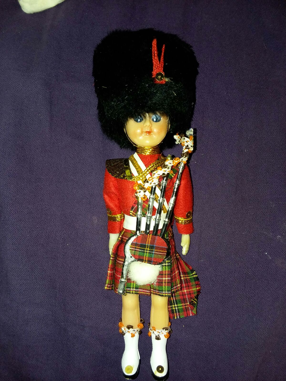 Antque Scottish doll light plastic