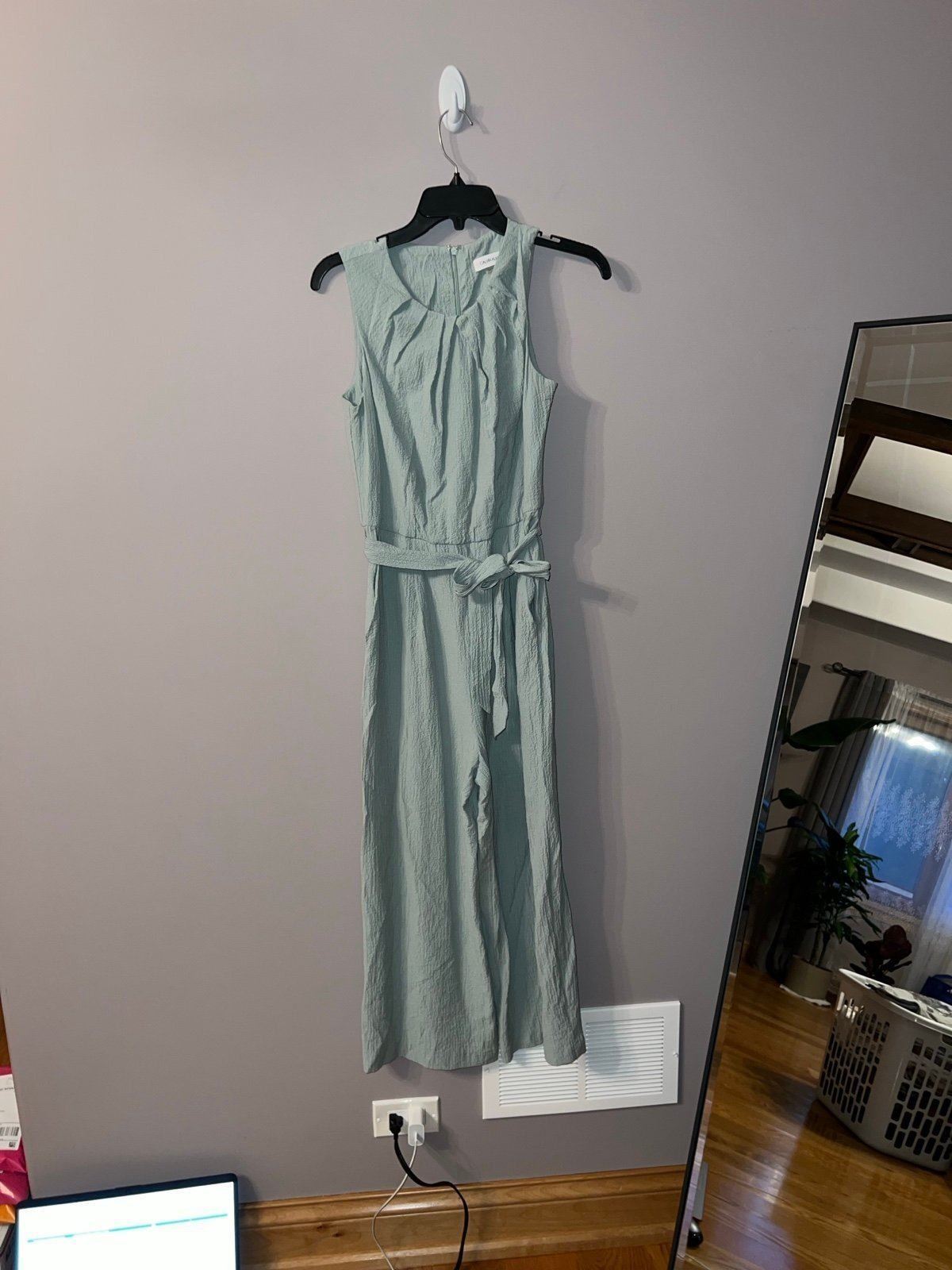 2959 NWOT Sage green high neck Calvin Klein Size 6 Jumpsuit new without tags