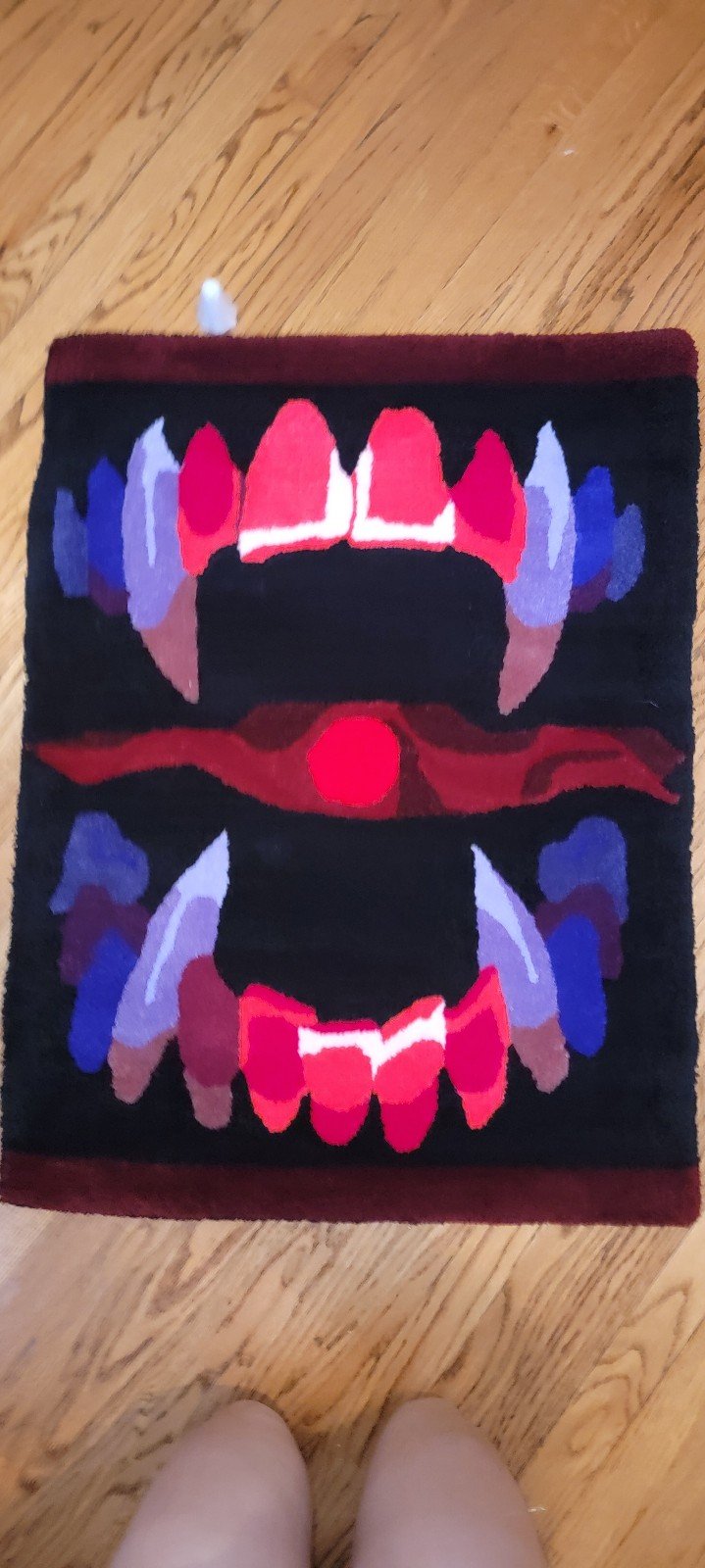 Large teeth in the void rug