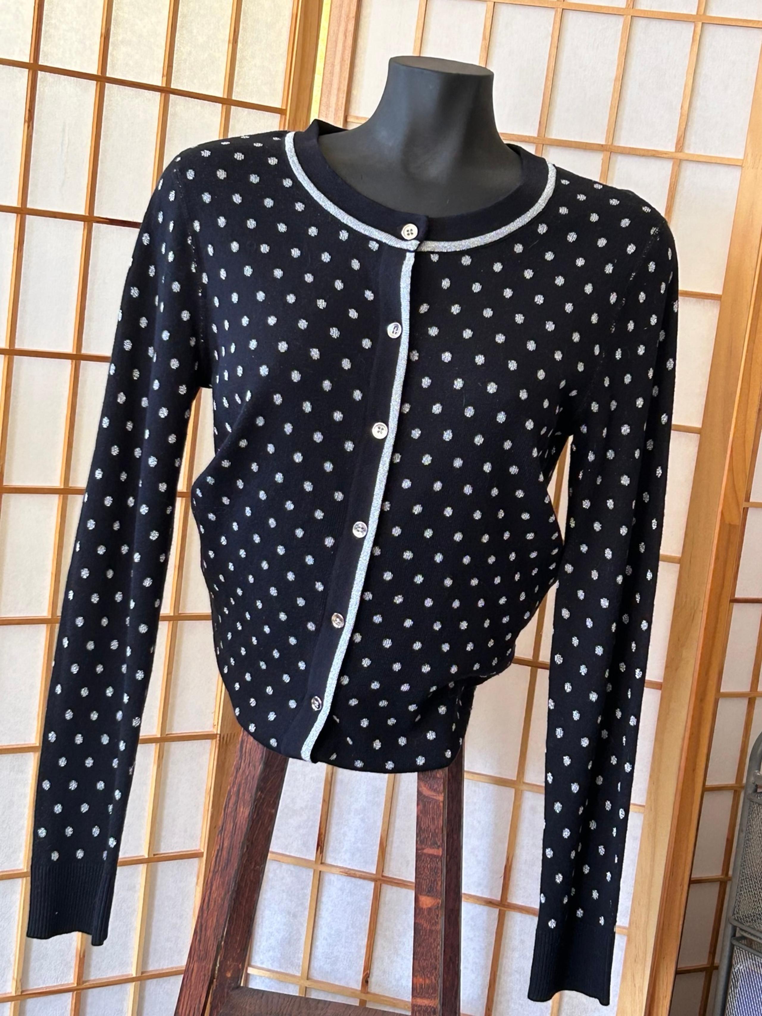 Cardigan black with dots.