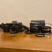 Canon t50 35mm film camera with two attachable lenses with bag
