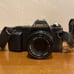 Canon t50 35mm film camera with two attachable lenses with bag