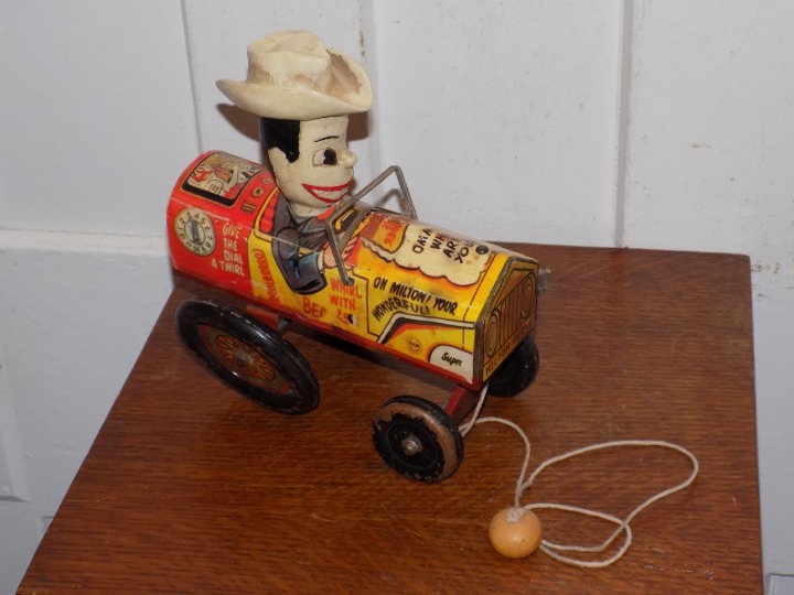 Vintage Milton Berle Tin Pull Toy Car