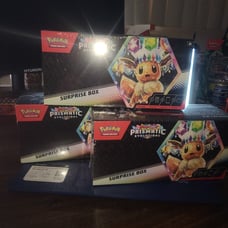 3 Pokemon PRISMATIC EVOLUTIONS SURPRISE. BOX. NEW.