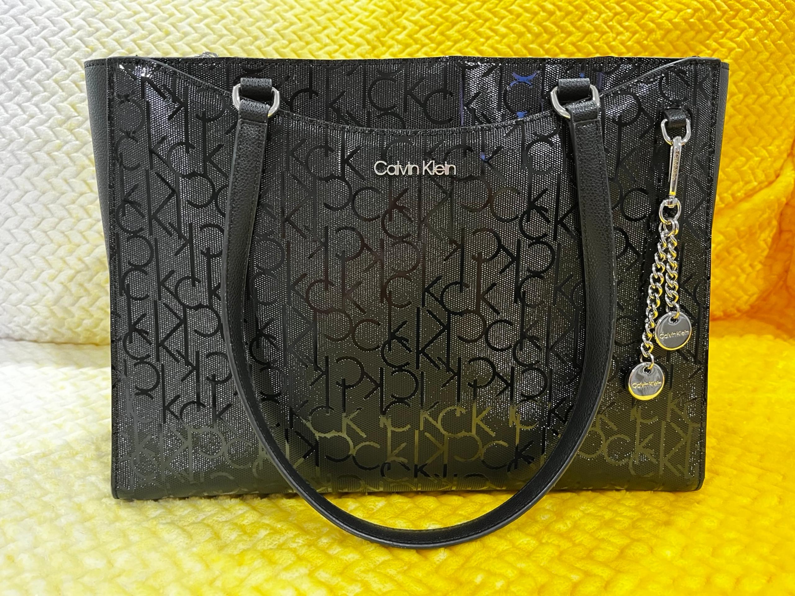 Calvin Klein logo, black patent leather shoulder bag