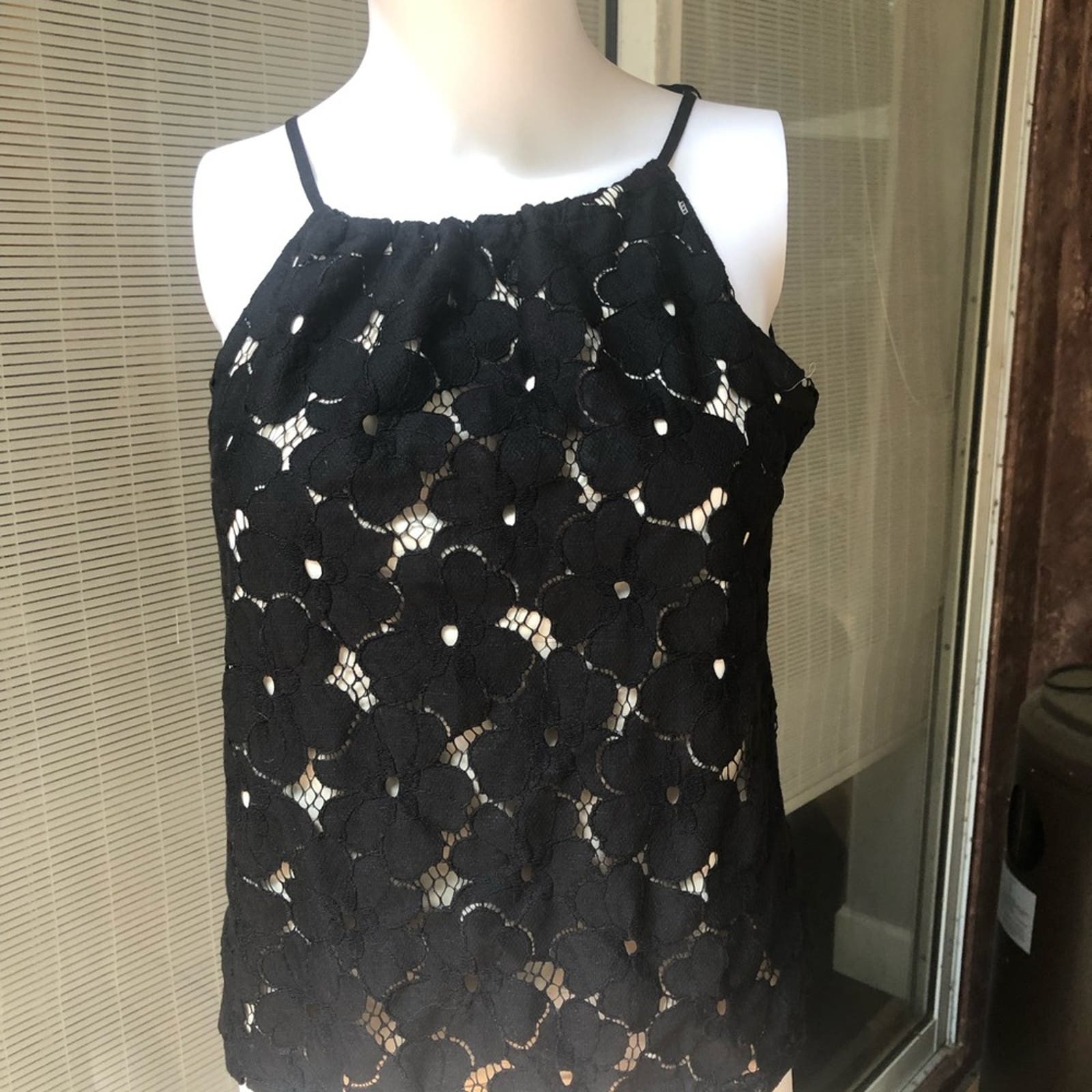 Great summer halter neck top with nude lining . Medium