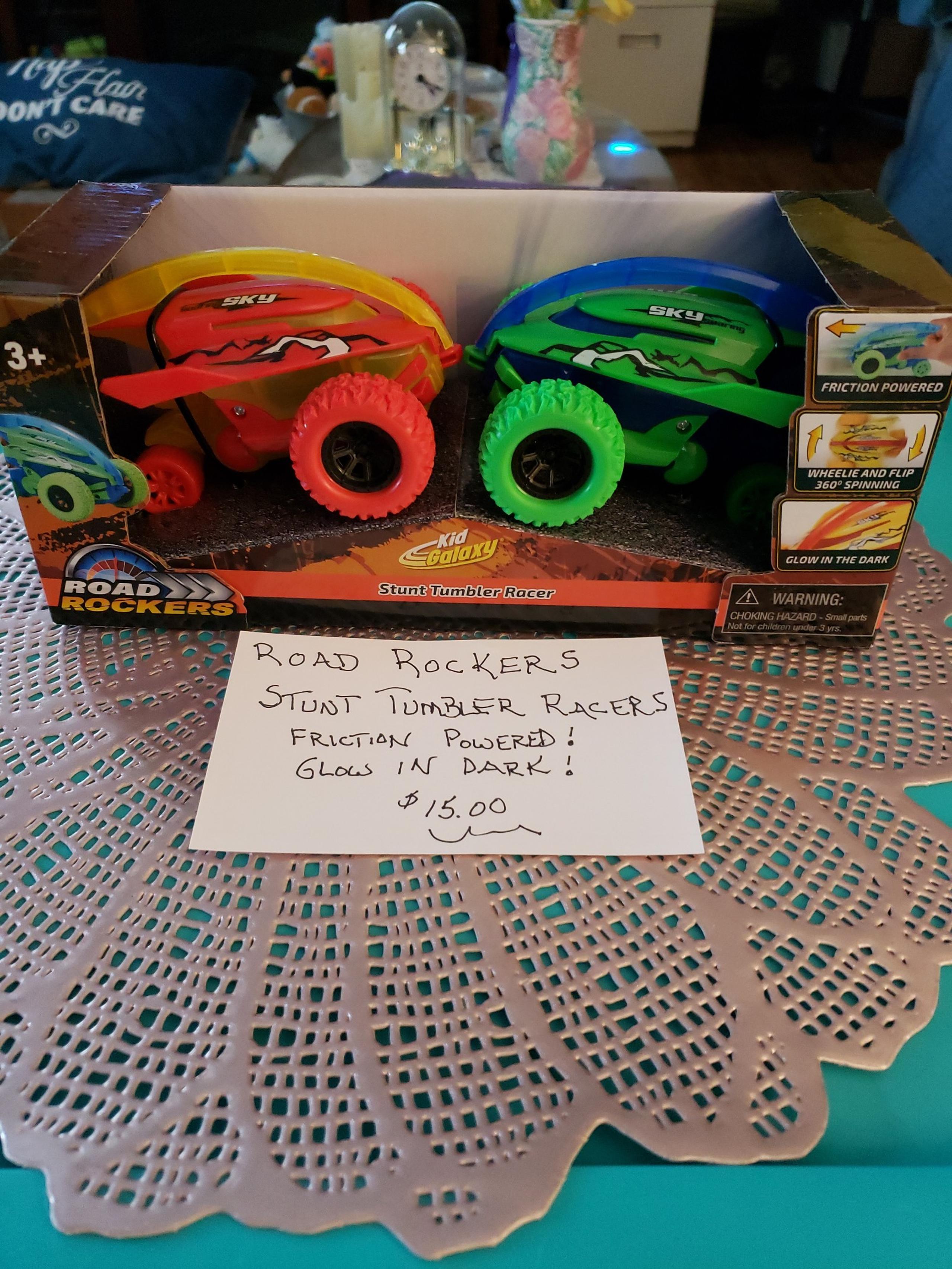 Road Rockers-Stunt Tumbler Racers-Friction Powered, Glow In Dark-$15.00
