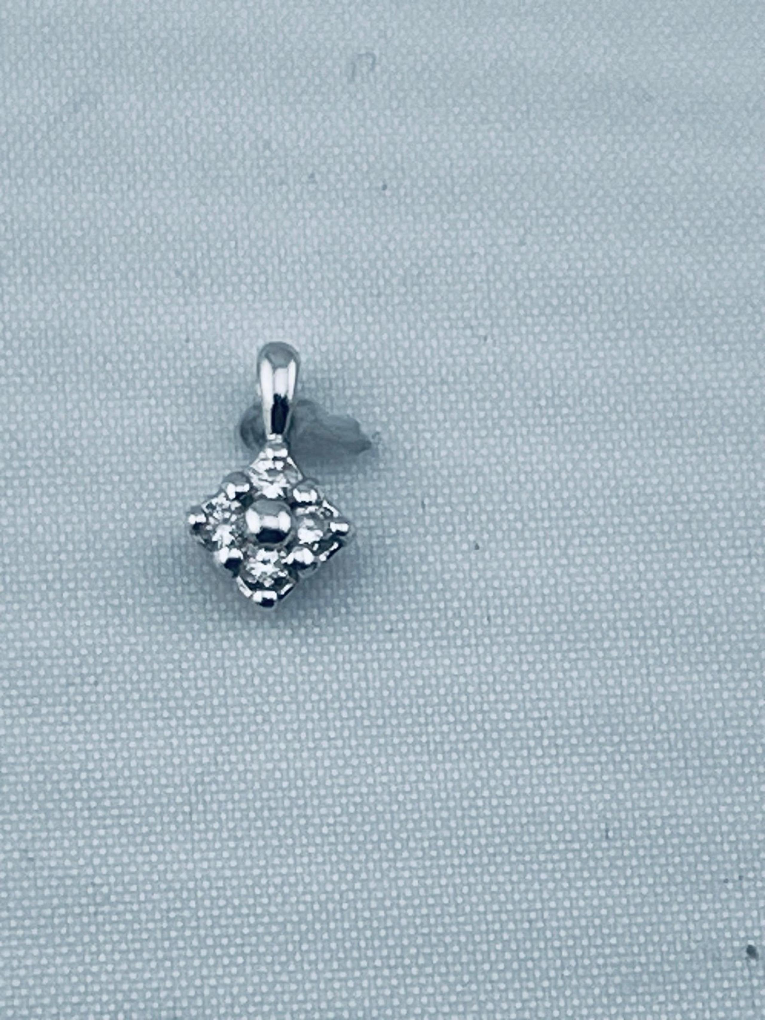 Vintage 1/10 carat diamond pendant 14kt white gold