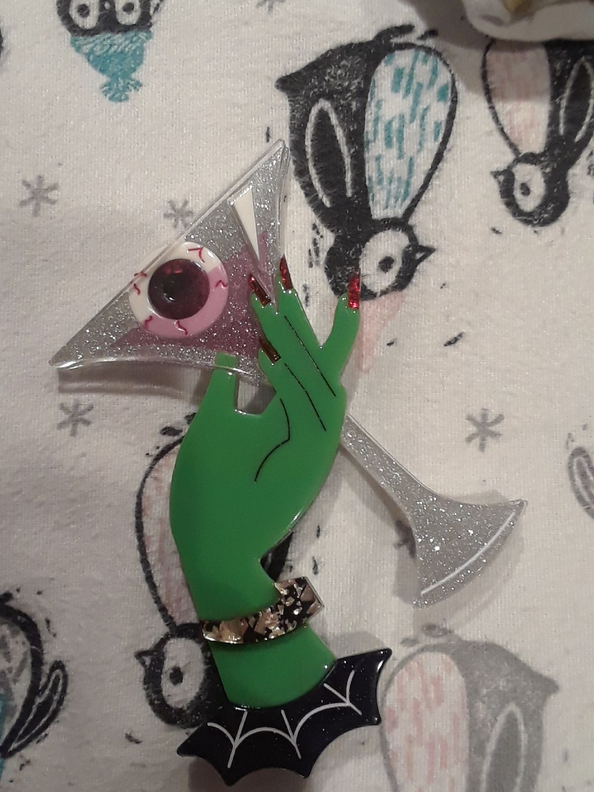 Lipstick and chrome pin