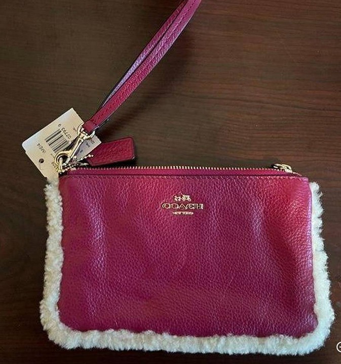 Pink Coach wristlet