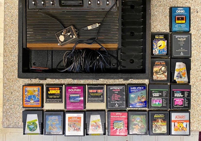 Vintage game console with 21 games & case