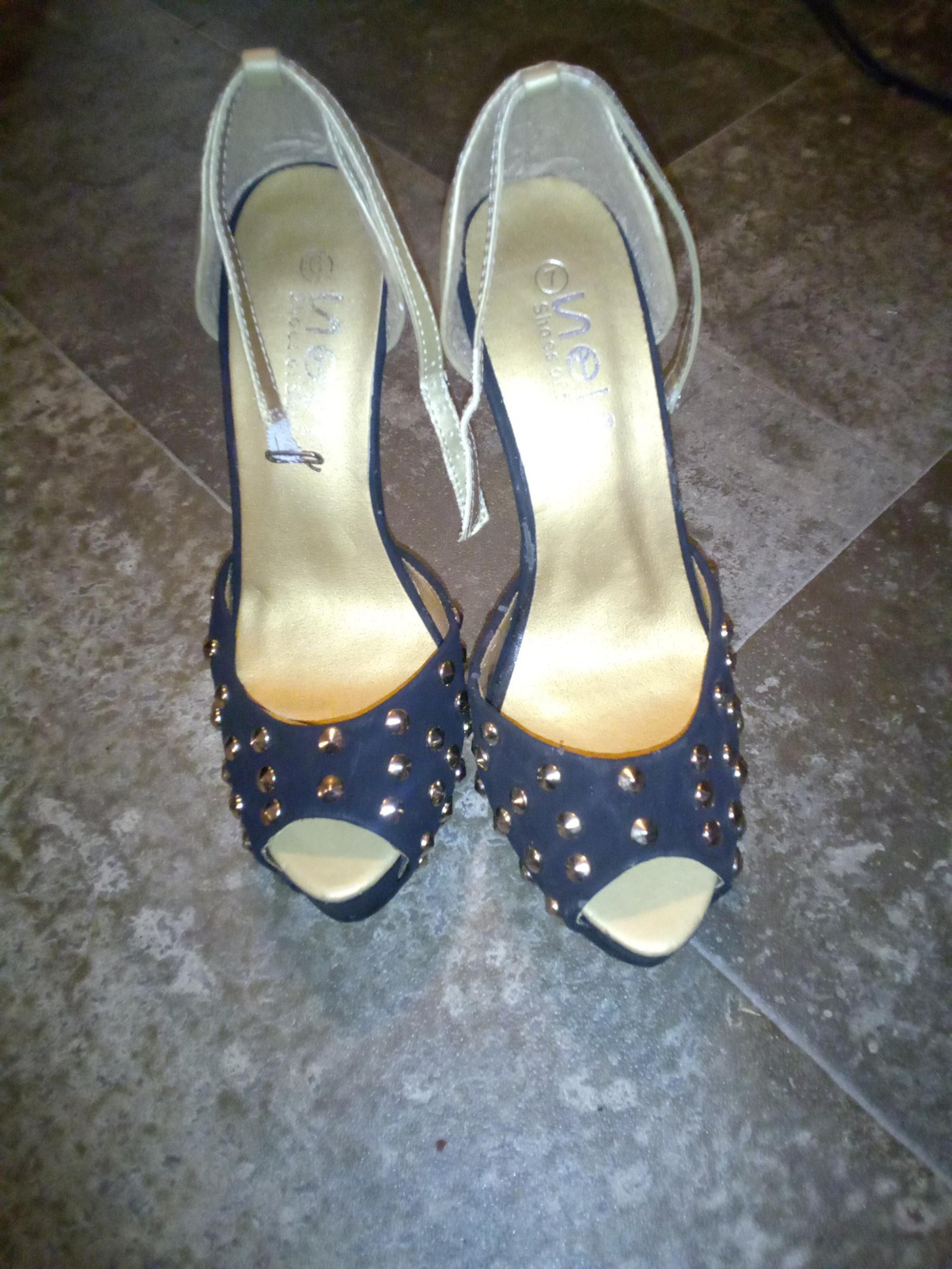 Size 7 women's opened toed heels.
