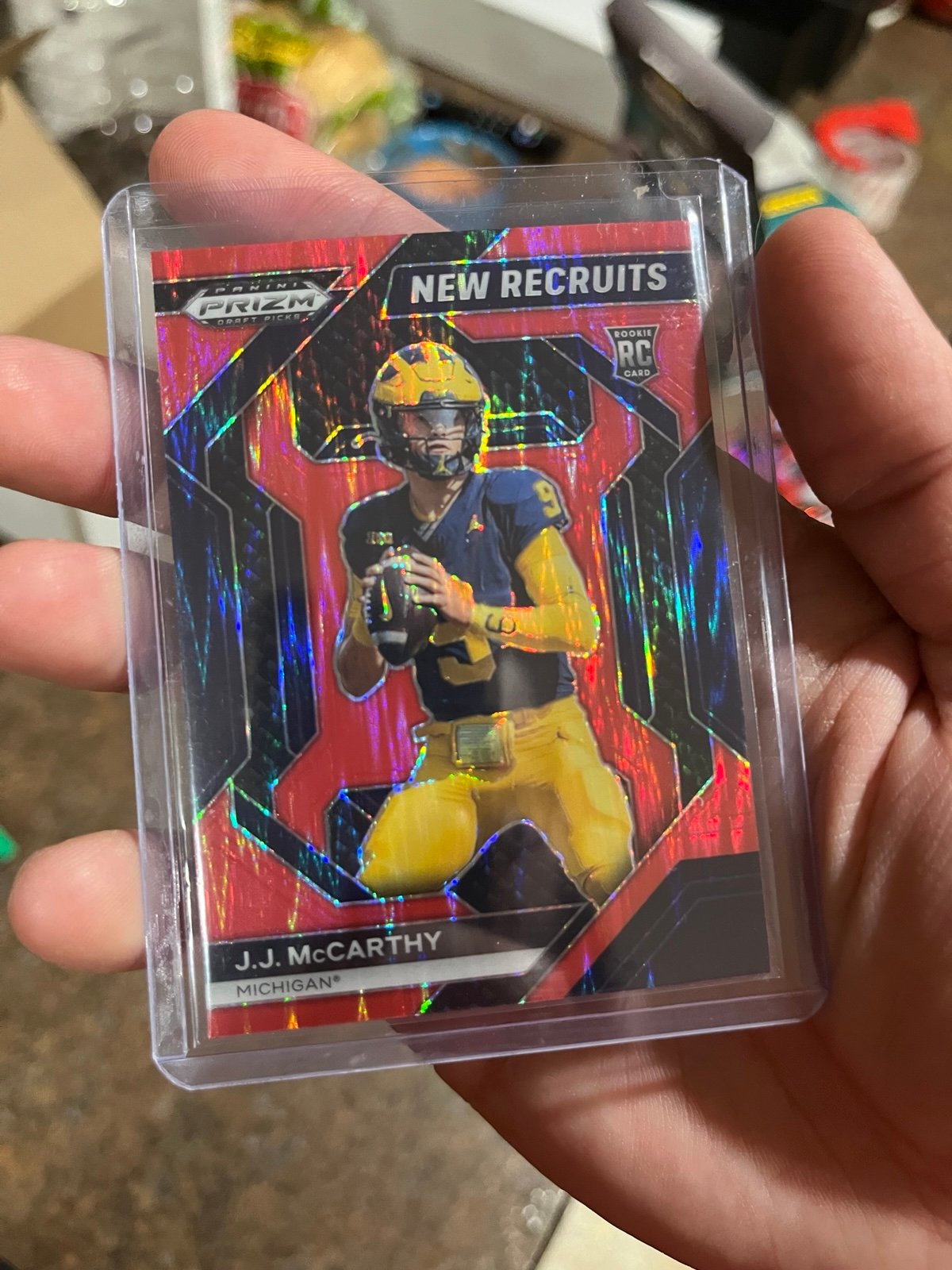 2024 Panini Prizm Draft Picks J.J. McCarthy RC New Recruits Red Flash #d 12/49