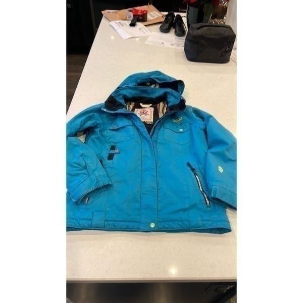 Orage yputh coat size 12 large blue green snow skirt, nice pockets hooded.
