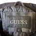 Guess Men's Medium Black Leather Jacket with Detachable Hood and Zipper Pockets