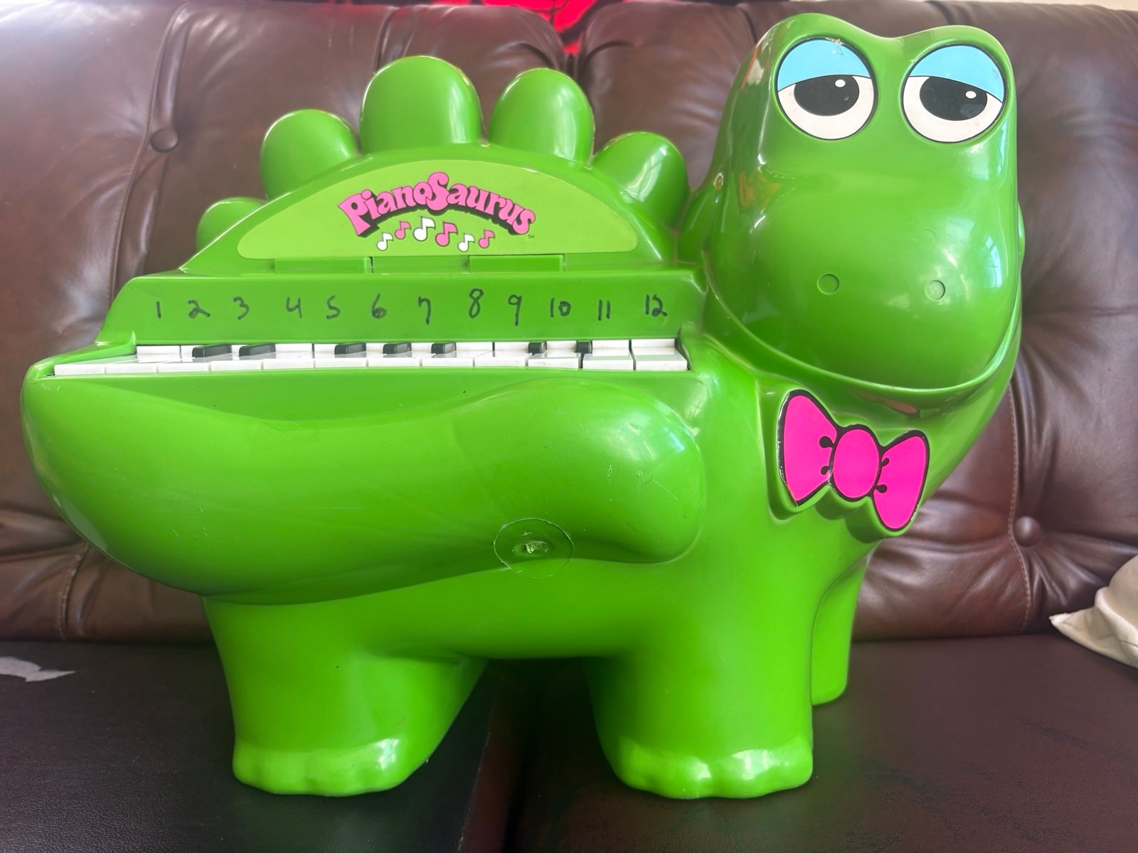 Vintage 1977 Dinosaur PIANOSAURUS Kids Piano Toy, with music sheet rare