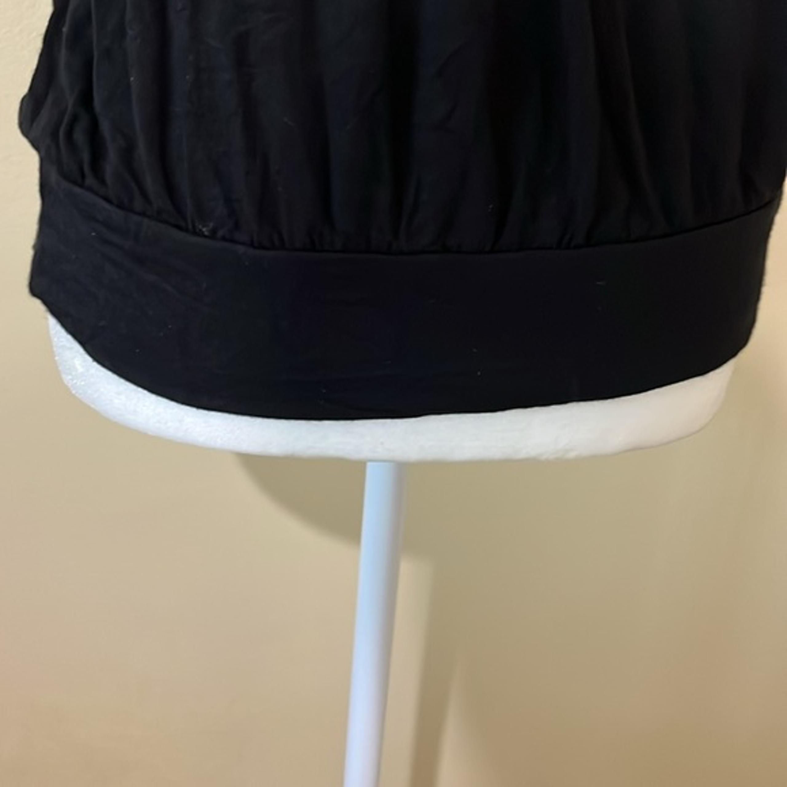 Black top with sequin collar detail