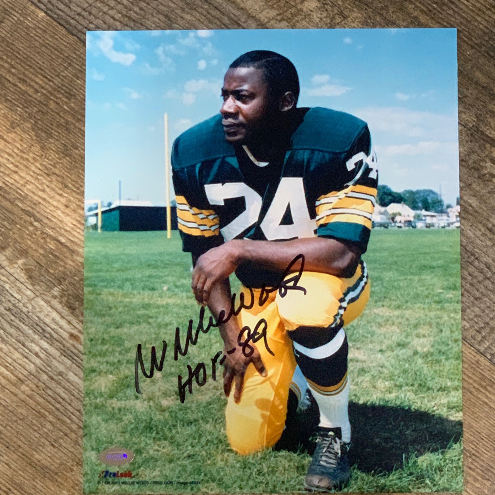WILLIE WOOD 8X10 PHOTO. MOUNTED MEMORIES autographed