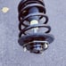 Strut-tek front driver side left complete strut spring assembly.