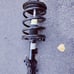 Strut-tek front driver side left complete strut spring assembly.
