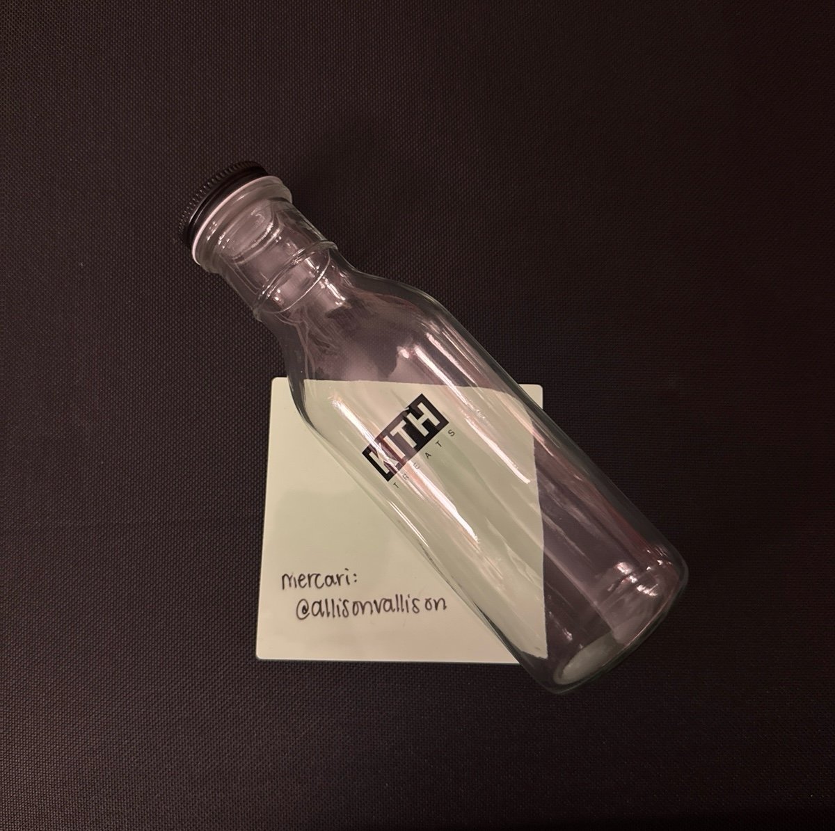 KITH Treats glass bottle