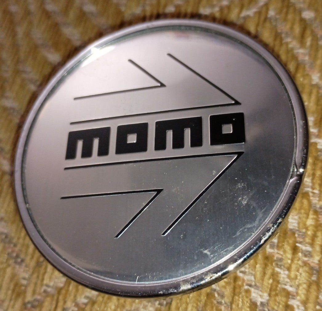 2-larger sized MOMO Wheel center caps