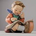 Hummel figurine boy thoughtful