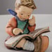 Hummel figurine boy thoughtful