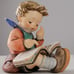 Hummel figurine boy thoughtful
