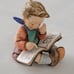 Hummel figurine boy thoughtful