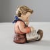 Hummel figurine boy thoughtful