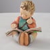 Hummel figurine boy thoughtful