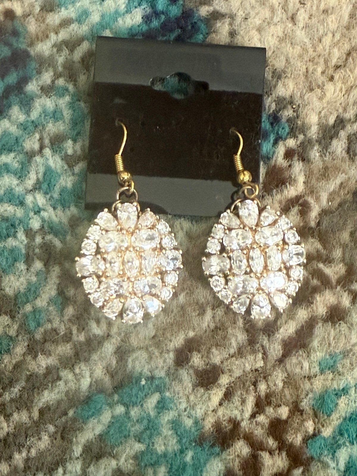 Fish hook back rhinestone earrings.