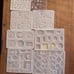 HUGE LOT OF RESIN MOLDS *lots of earrings, grinders, a tray, coasters*