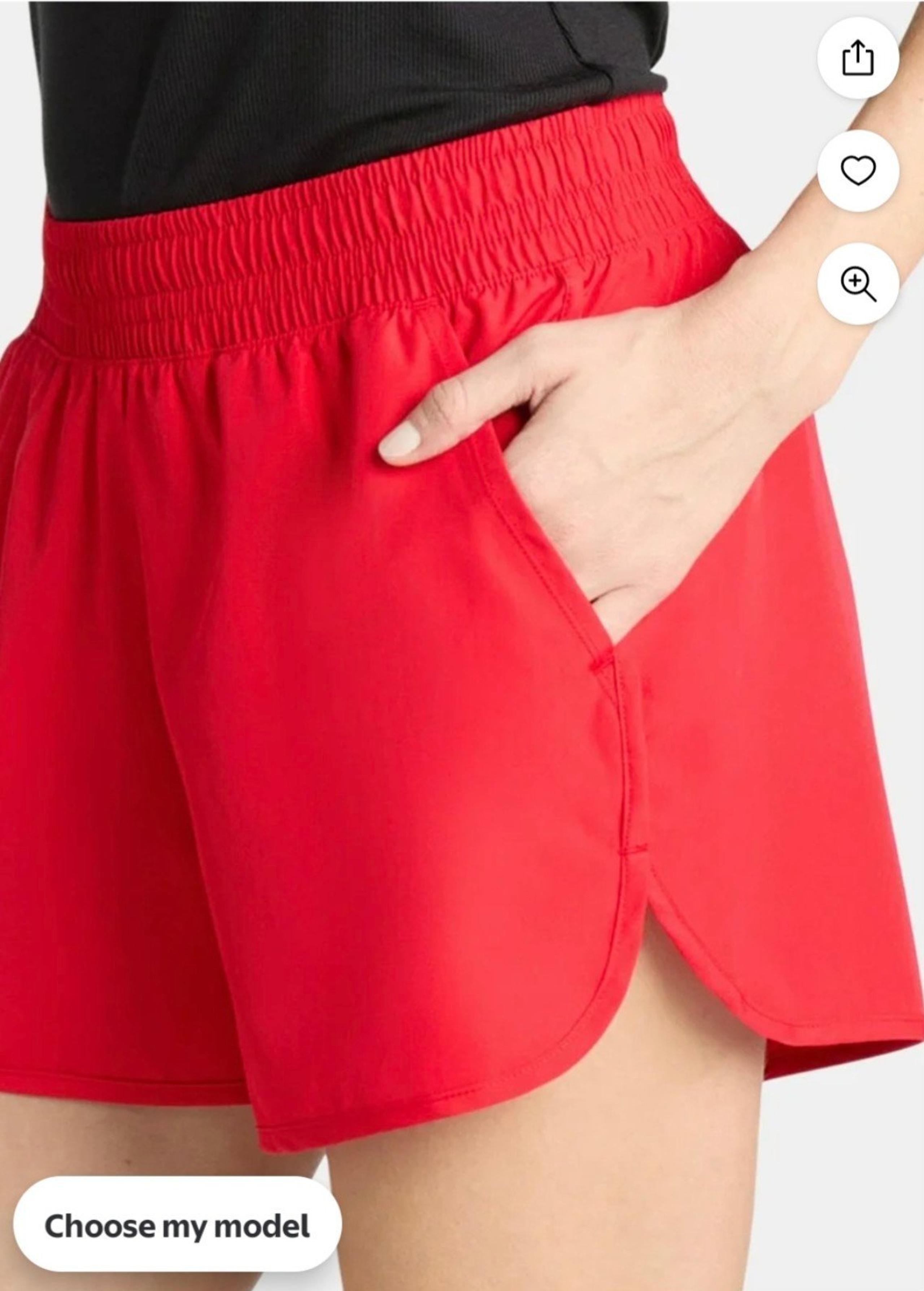 Women's red running shorts with zippered pockets and  liner athletic works