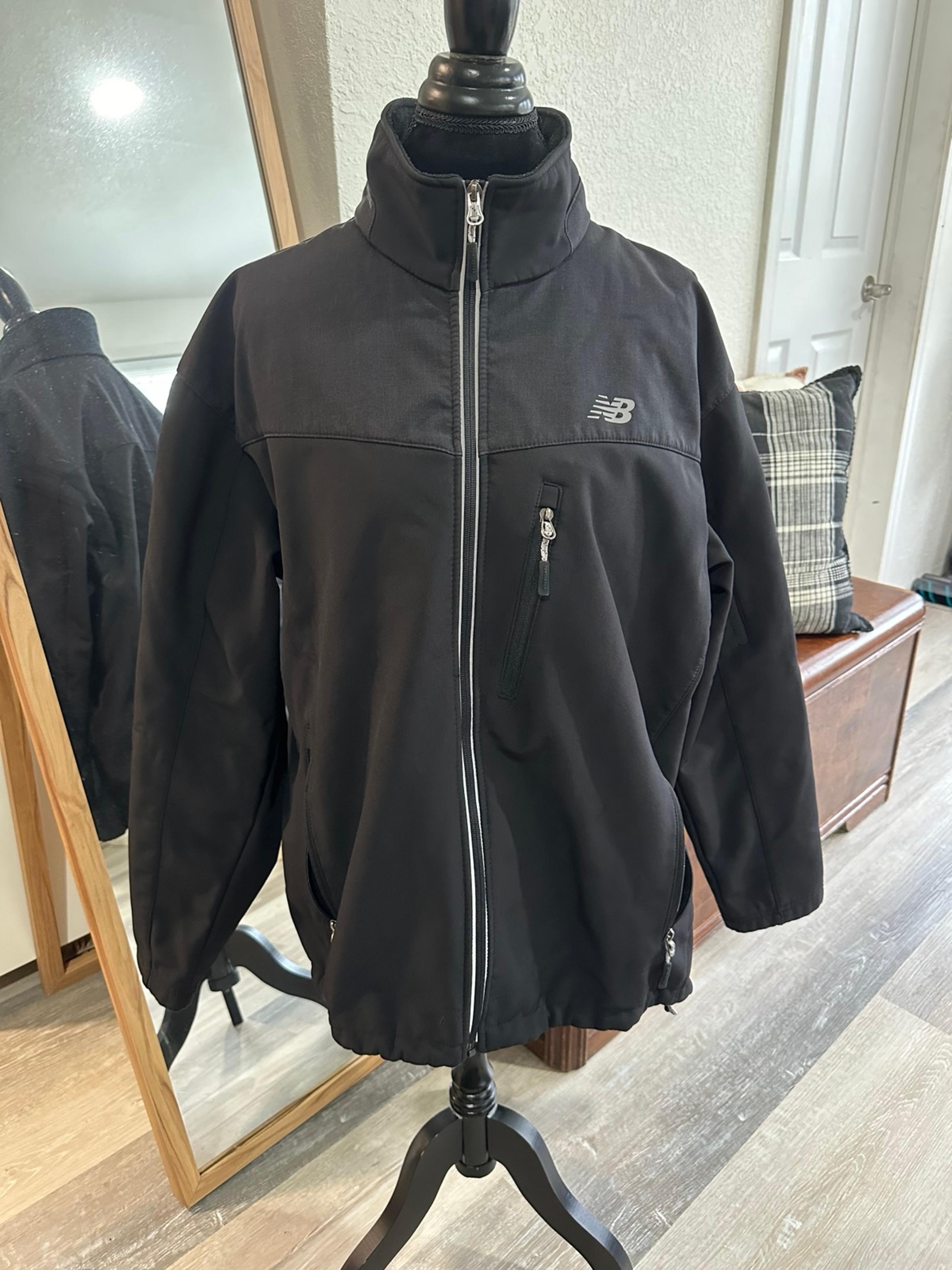New Balance Jacket

Size: XL
Condition: Good, small white marks on the back.