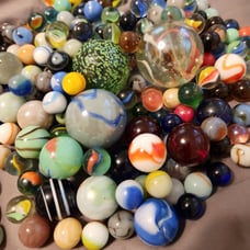Vintage marble collection in a jar