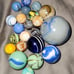Vintage marble collection in a jar