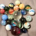 Vintage marble collection in a jar