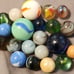 Vintage marble collection in a jar