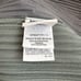 Homme Plisse Belted Carpenter Shorts