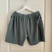 Homme Plisse Belted Carpenter Shorts