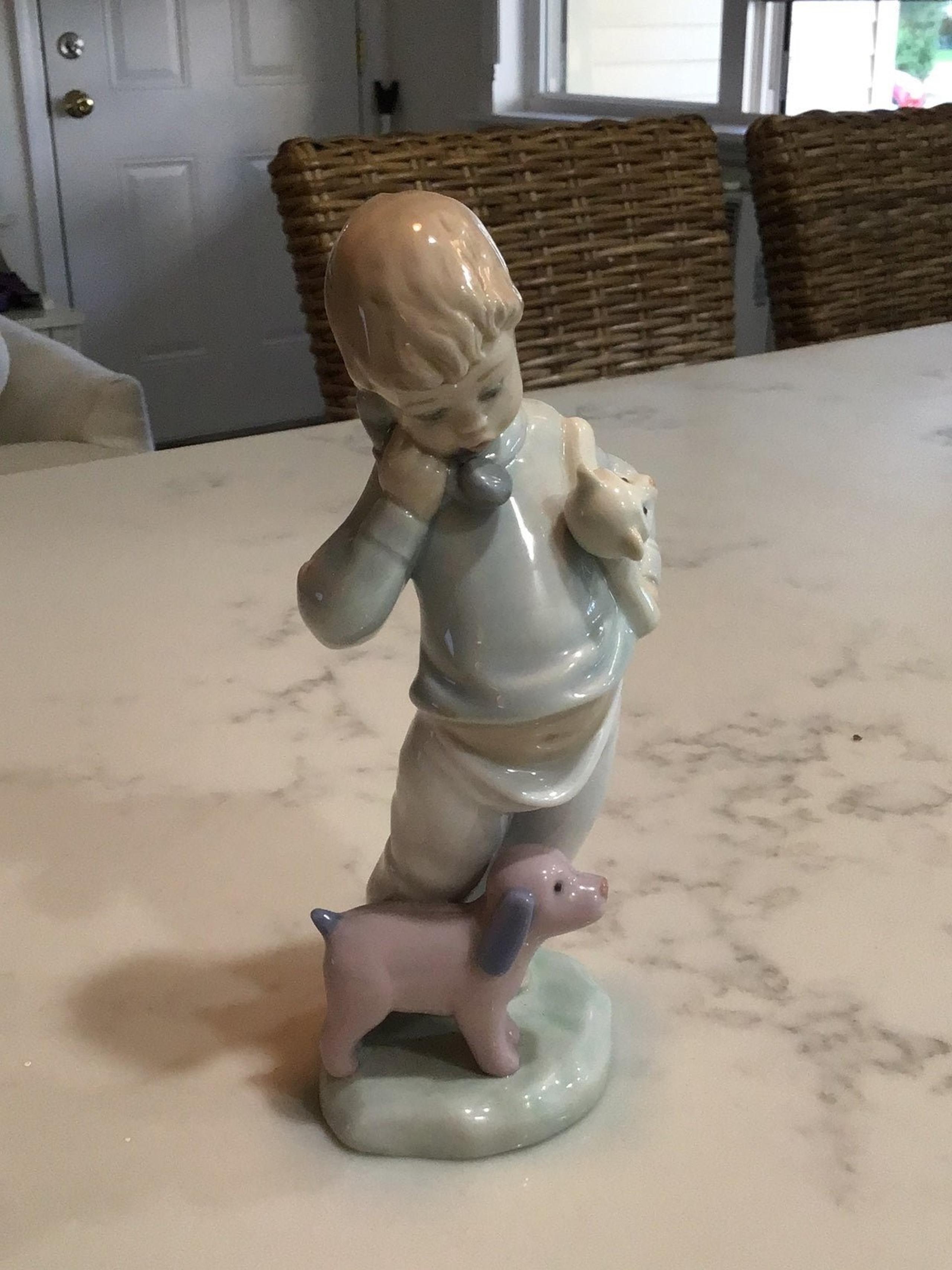 LLADRO (NAO) Boy on Phone with Dog and Teddy Bear