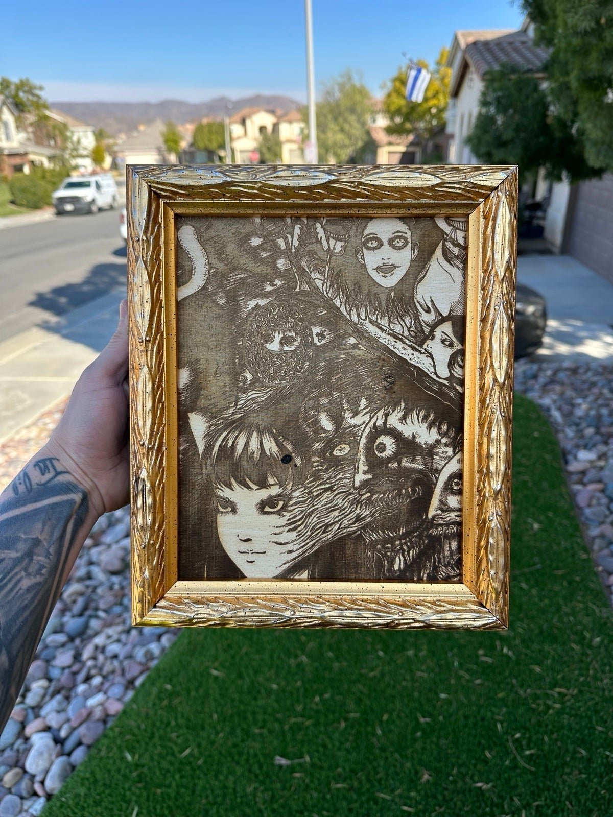 Custom laser engraved Junji Ito gold framed board