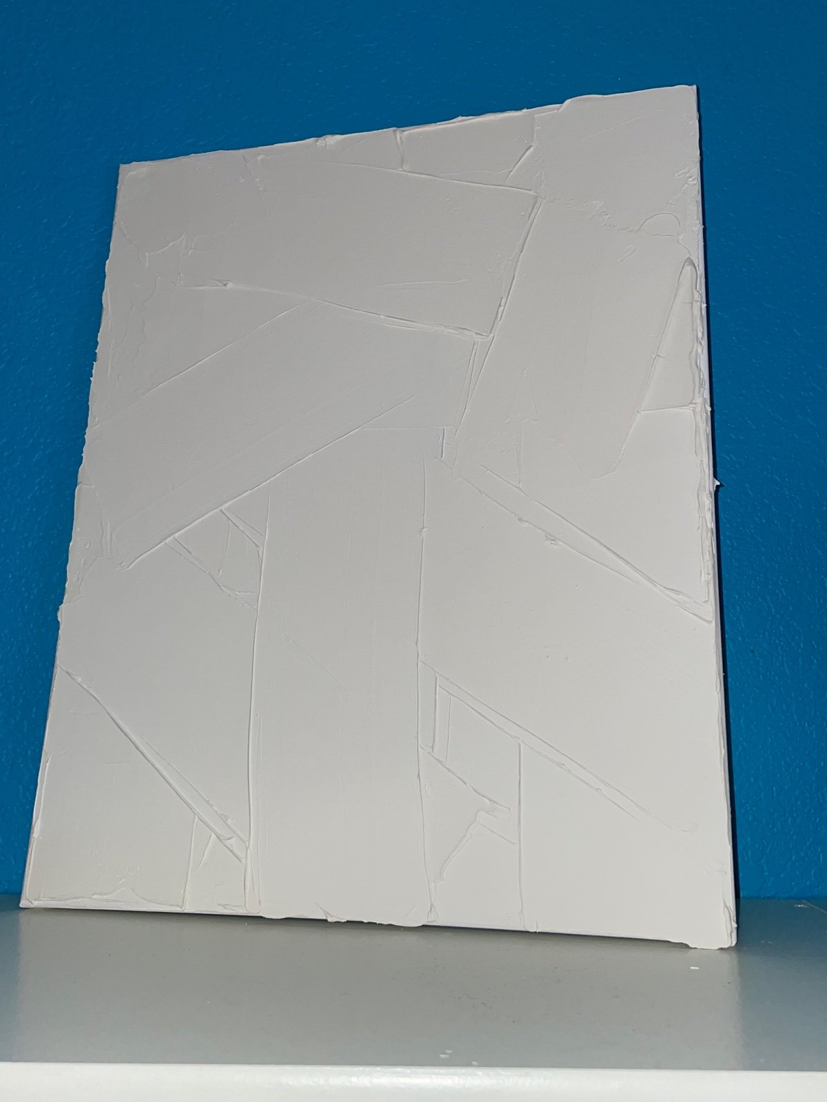 Plaster on canvas 18 by 20