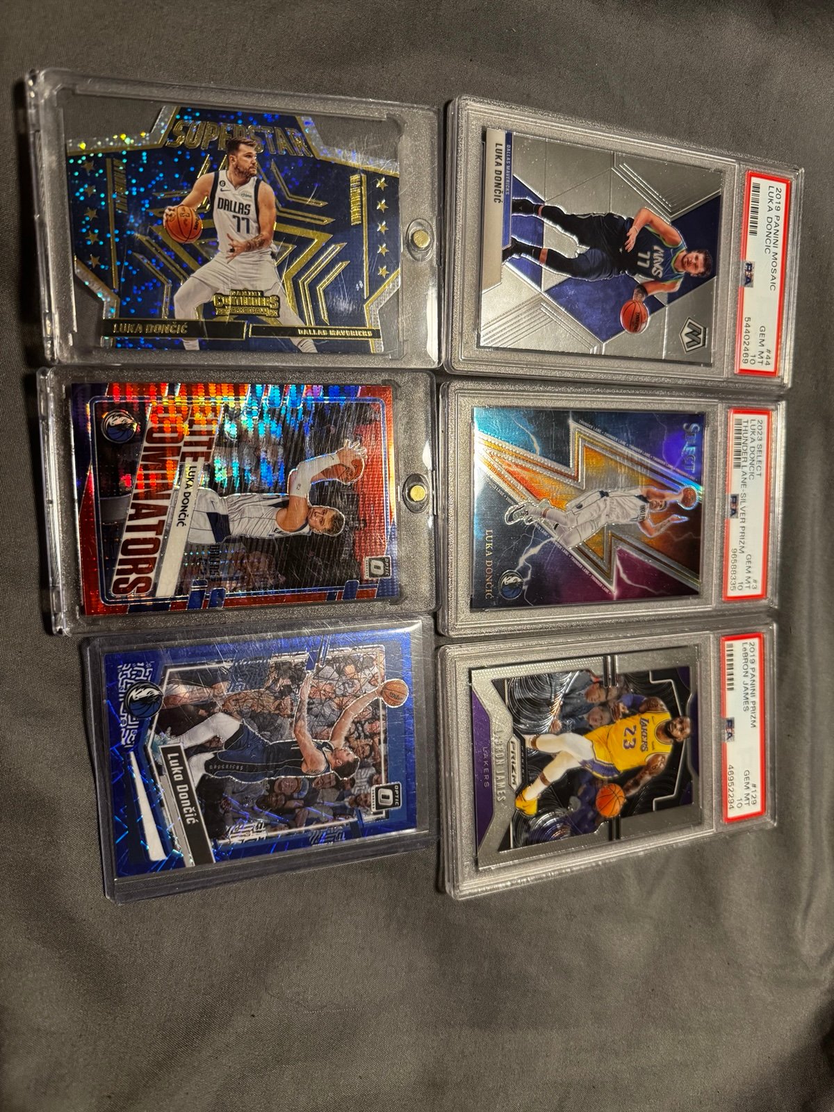 Luka Doncic lot with bron. 3 PSA 10 and 3 luka refractor cards.invest