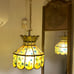 Vintage swag lamp plugs into the wall