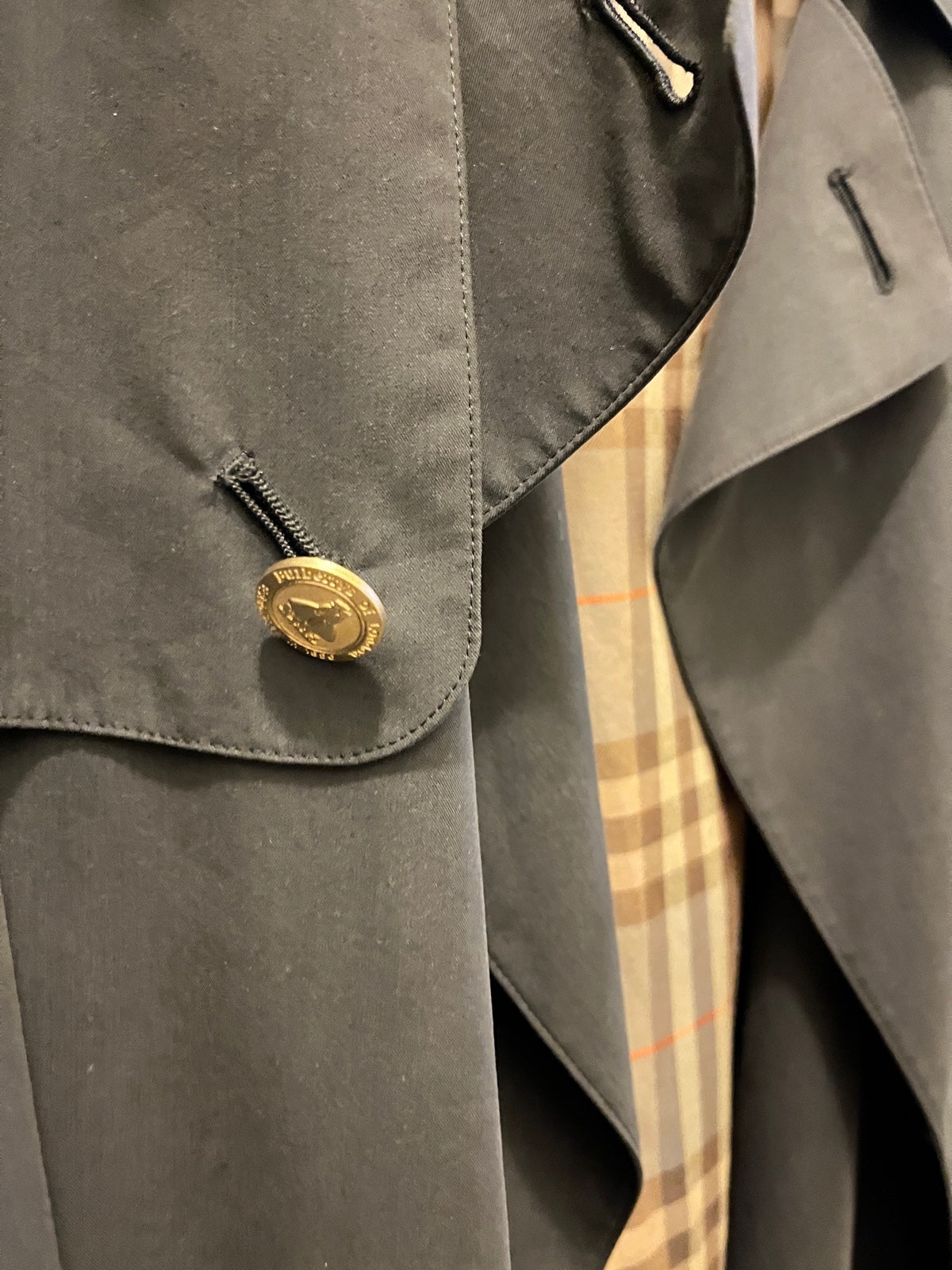 Burberry green trench coats
