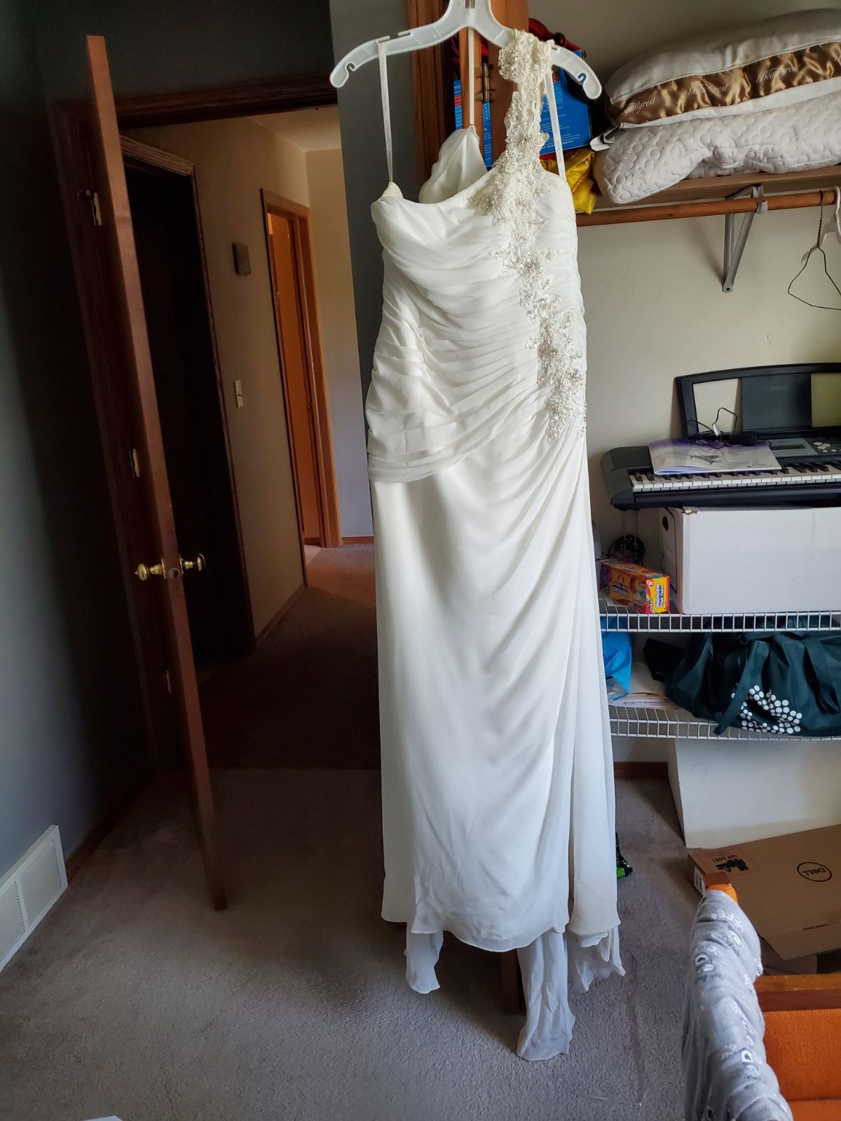 wedding dress and tear drop vail